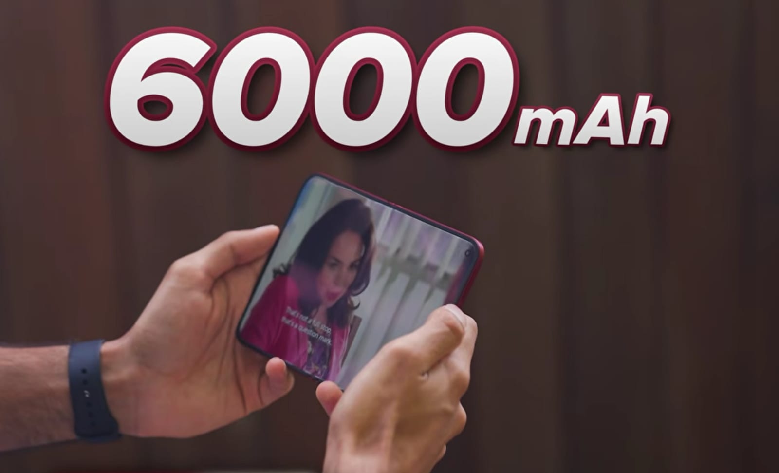 The Xiaomi 18 Fold playing video, alongside a graphic reading 6000 mAh.
